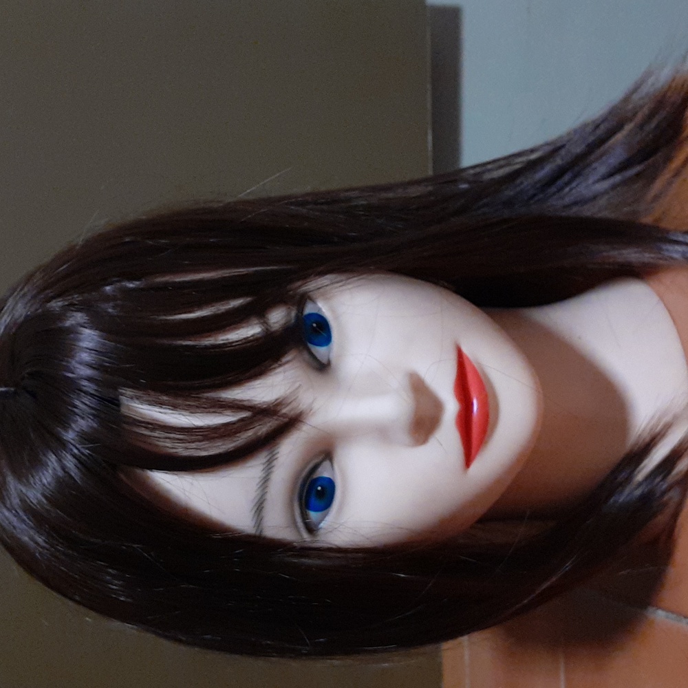 This is a topper piece with bangs
